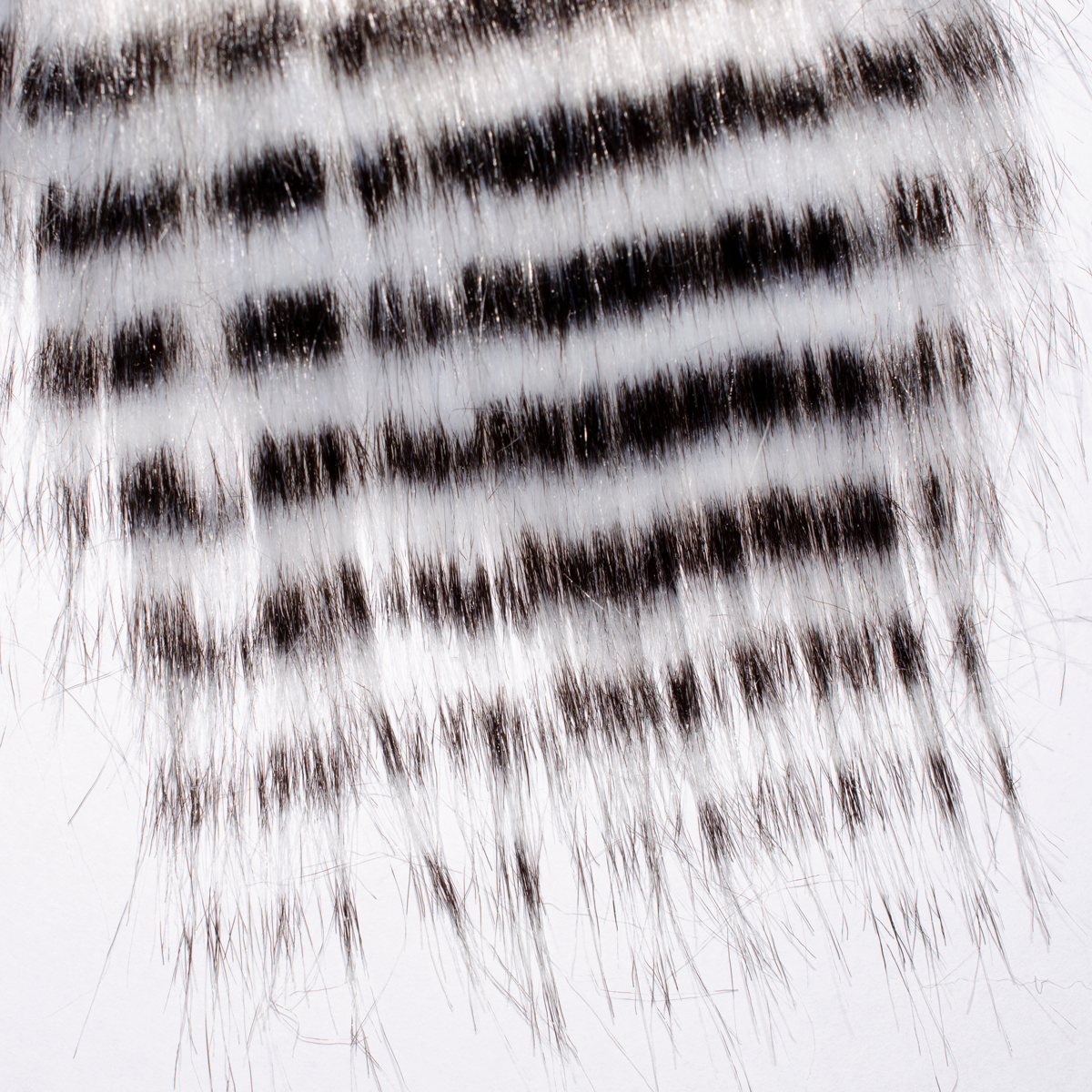 White Barred Black Fly Fur is included in the Saltwater Fly Fur 4 Pack assortment.